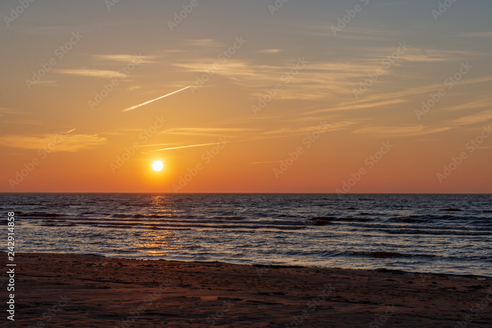 beautiful. red sunset over the sea, lake with clear sky