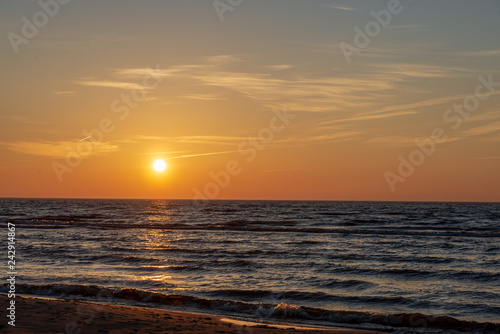 beautiful. red sunset over the sea  lake with clear sky