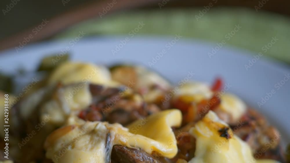 Close-up: Piece of Delicious Food Picked Up With Fork Close-up: Piece of Delicious Food Picked Up With Fork