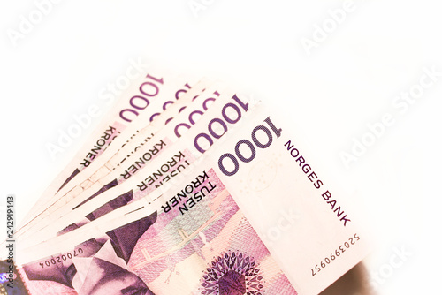 Transfer twisted banknotes. Money in hand close-up.