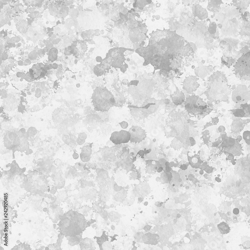 Gray paint splatter effect texture on white paper background. Artistic backdrop. Different paint drops.