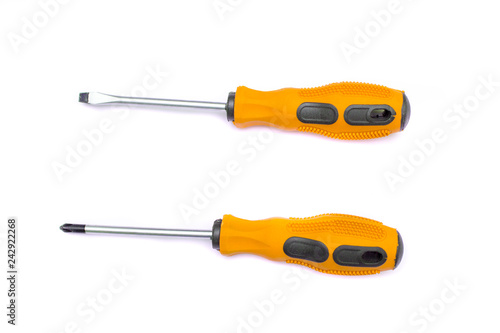 Black and orange screwdriver isolated on white background. Screwdriver for repairing and tightening screws