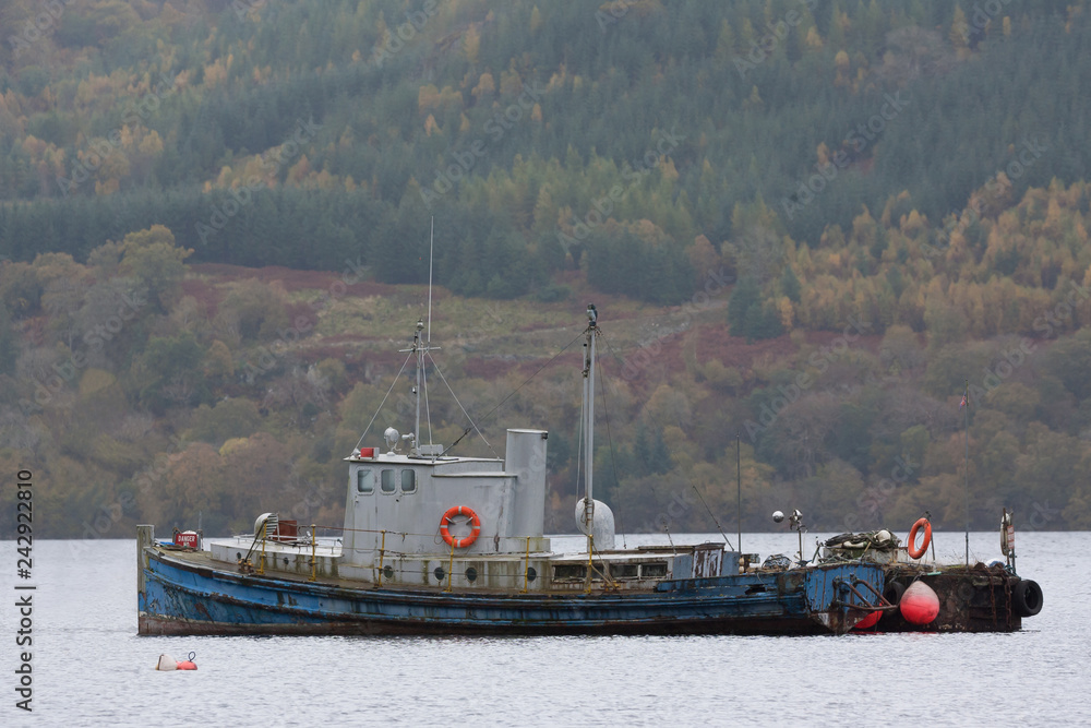 old steamboat on scottish loch old steamboat on scottish loch
