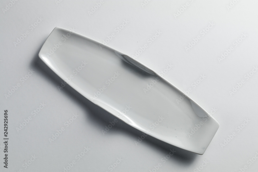 modern and clean white plate isolated on white background modern and clean white plate isolated on white background