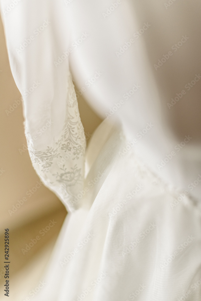 Wedding dress placed in a mannequin ready to dress her the bride.