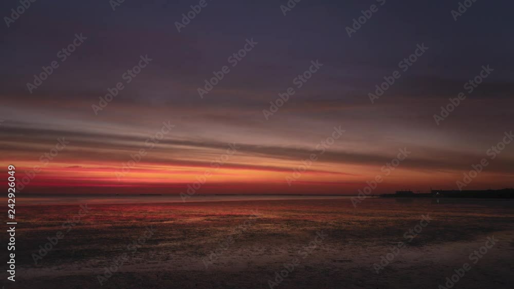 Gorgeous sunset with twilight sky and some of seagulls still wandering around Gorgeous sunset with twilight sky and some of seagulls still wandering around