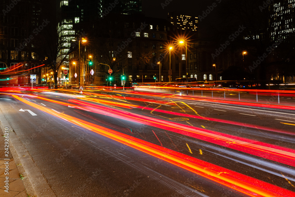 light trails of car traffic in the city at night