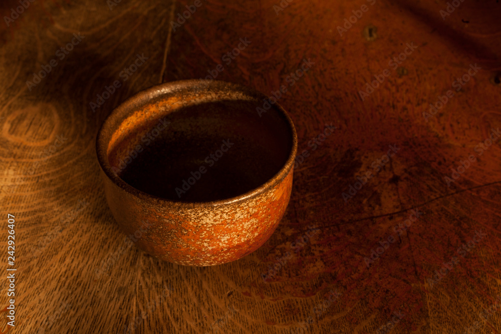 Anagama Fired Bowl on Wood Background