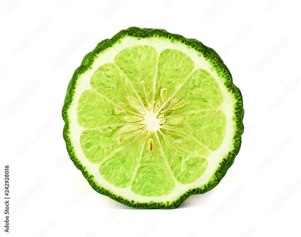 Close up a cut half of Bergamot fruit and leaf on white background which it use for famous Asian herbal ingradient of food such as Chili paste and hair treatment.
