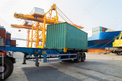 Truck with Industrial Container Cargo for Logistic Import Export at yard