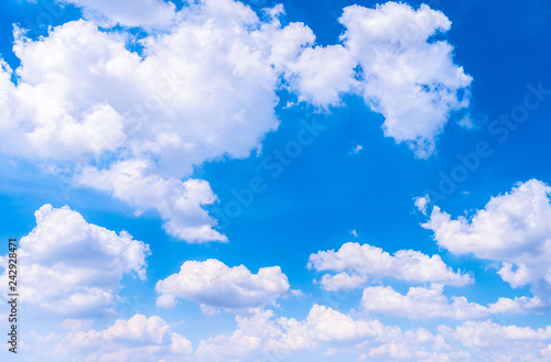 Beautiful white clouds with blue sky.Color shade gradient from white to blue using for fresh background wallpaper.
