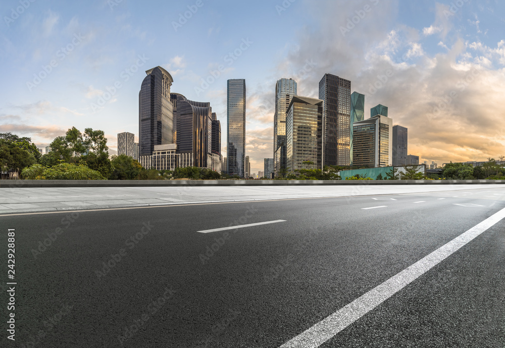 Empty asphalt road through modern city in shenzhen, China Empty asphalt road through modern city in shenzhen, China