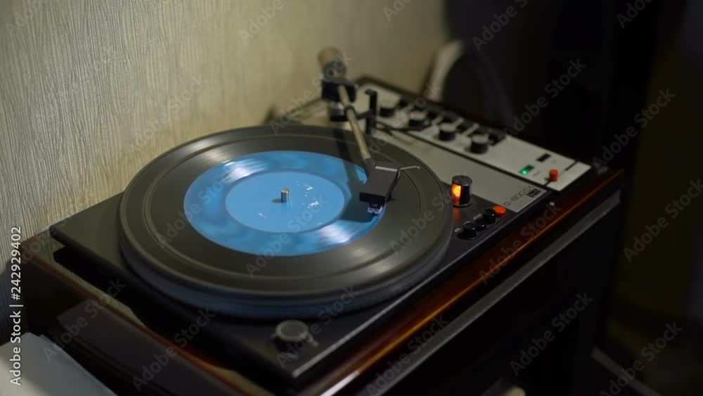 Retro Turntable Playing Blue Vinyl Record Retro Turntable Playing Blue Vinyl Record
