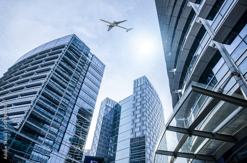 low angle view of modern metallic skyscrapers,blue toned,suzhou,china.