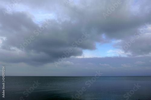 Sea under the cloudy sky