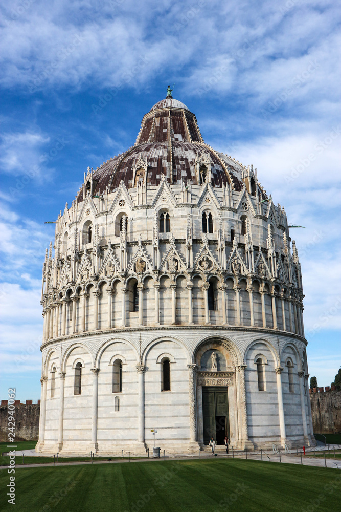 Pisa Baptistery of St. John against a blue sky, Piazza dei Miracoli (Square of Miracles), Pisa, Tuscany, Italy