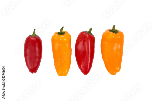 Ovely mini red and yellow peppers on white isolate background. Fresh vegetable