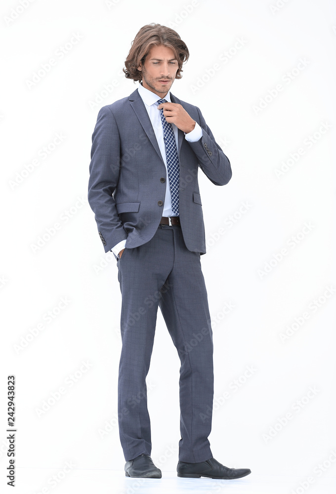 Full length of a fashion male model over white background. Full length of a fashion male model over white background.