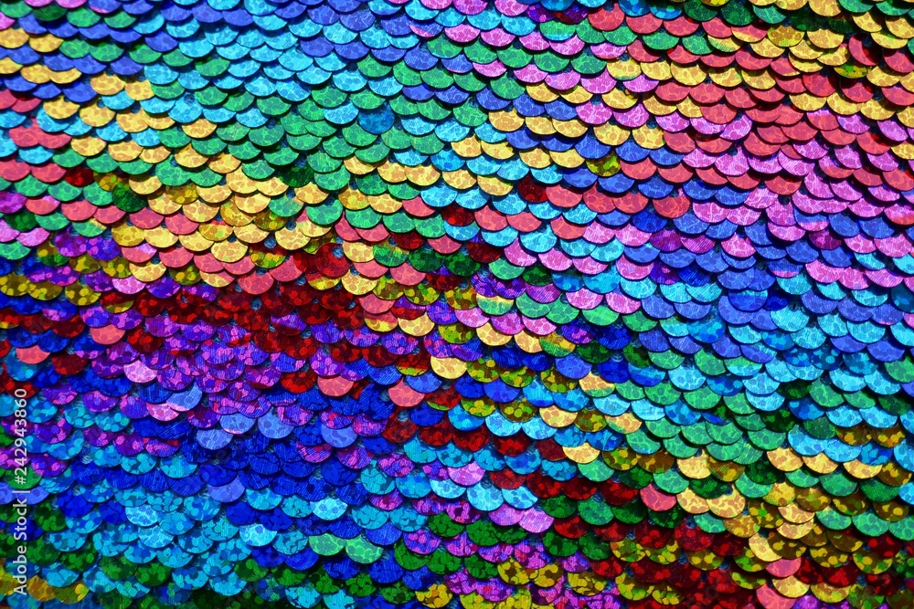 Sequins macro background.Multicolored sequins.Rainbow. Scales background. Paillette fabric background. sequined textile