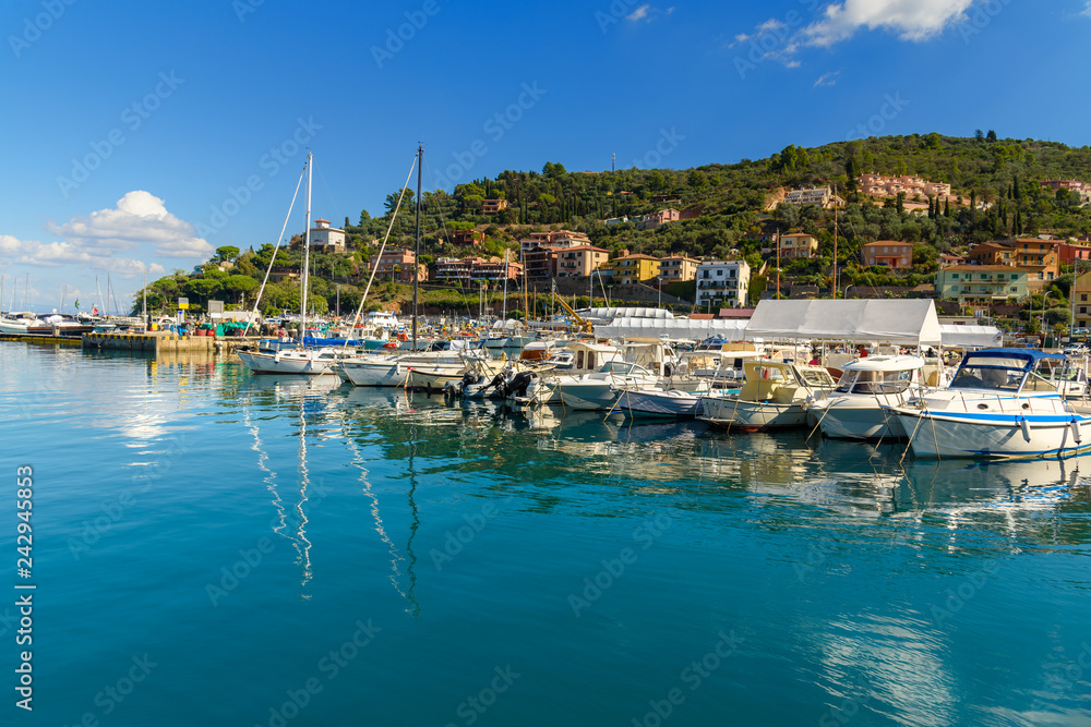 View of harbor seafront in seaport town Porto Santo Stefano in Monte Argentario. Italy