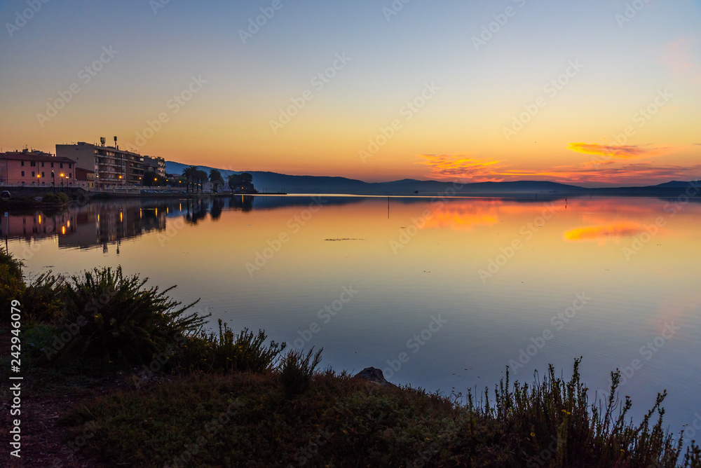 View of Orbetello in lagoon on peninsula Argentario at sunrise. Italy