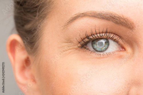 Fototapeta Naklejka Na Ścianę i Meble -  Caucasian female eye suffering from blindness by cataract