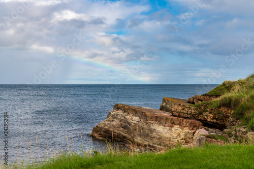 Rainbow over the North Sea, seen in Benthall, Northumberland, England, UK