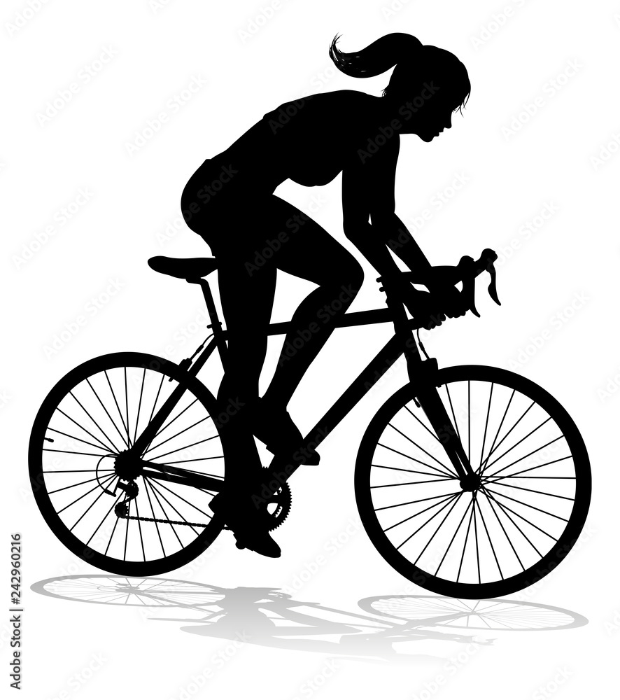 A woman bicycle riding bike cyclist in silhouette A woman bicycle riding bike cyclist in silhouette