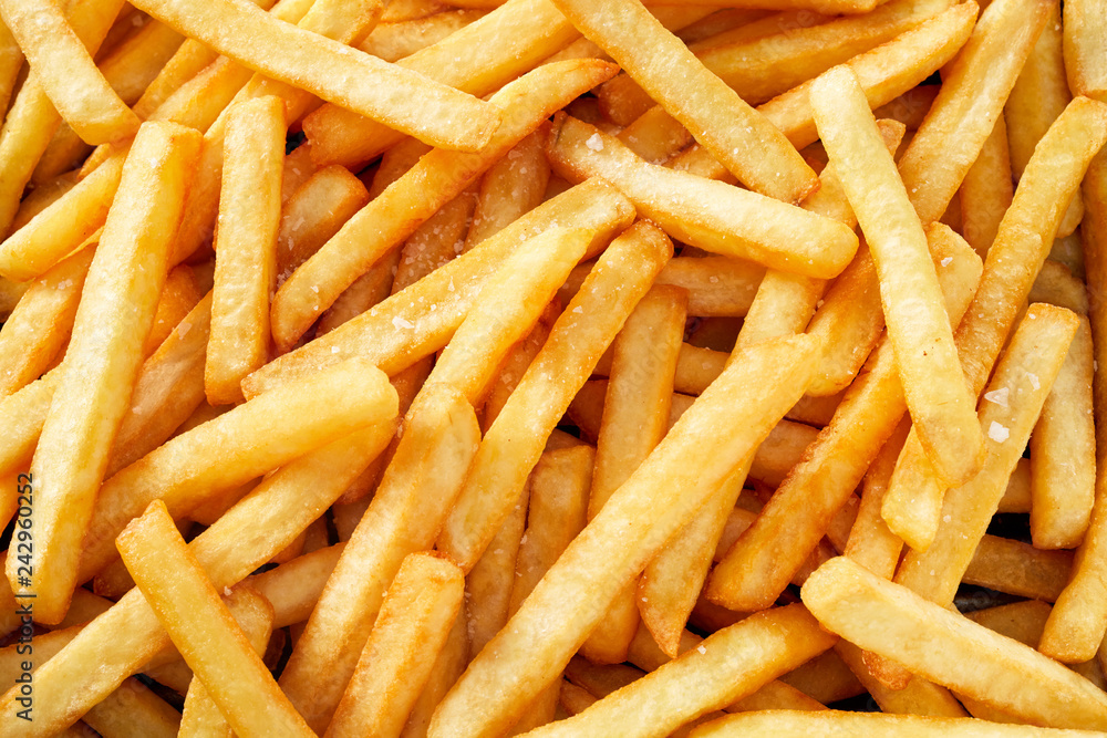 Fresh potato french fries in full frame Fresh potato french fries in full frame