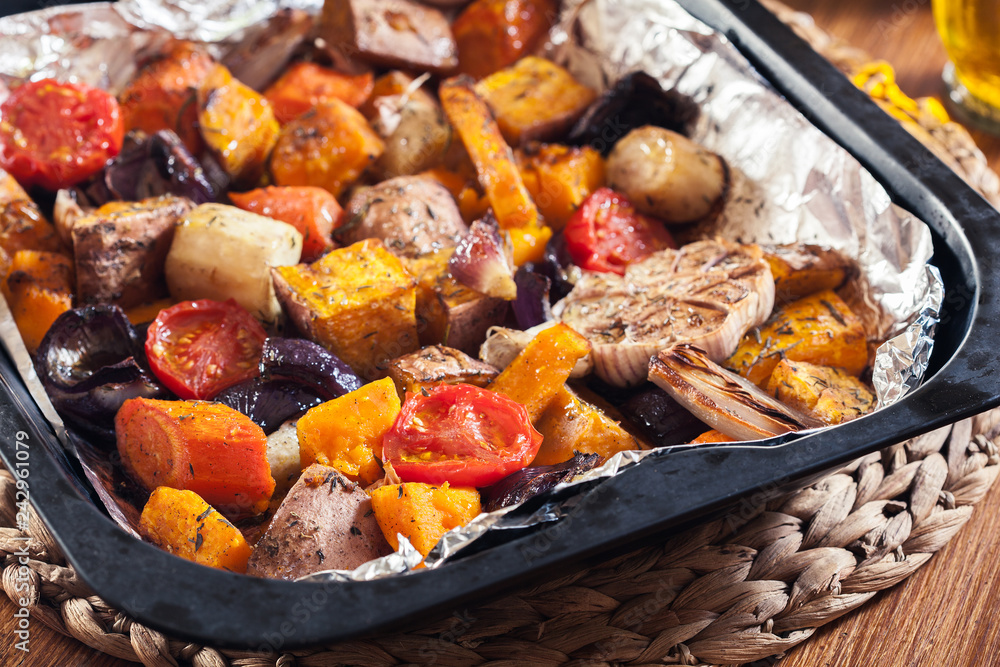 Roasted vegetables on baking metal tray Roasted vegetables on baking metal tray