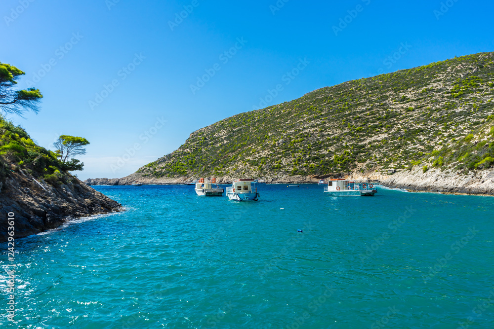 Greece, Zakynthos, Tour boats in small porto vromi harbor