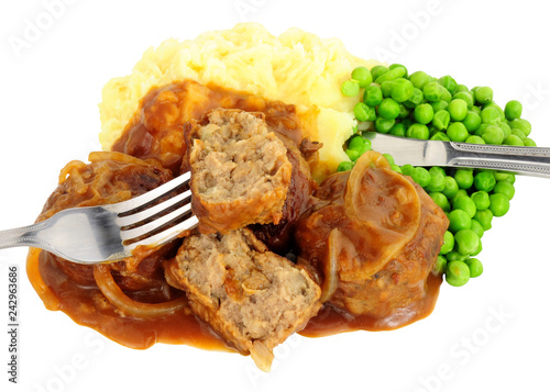 Pork faggot meal with mashed potatoes and peas isolated on a white background