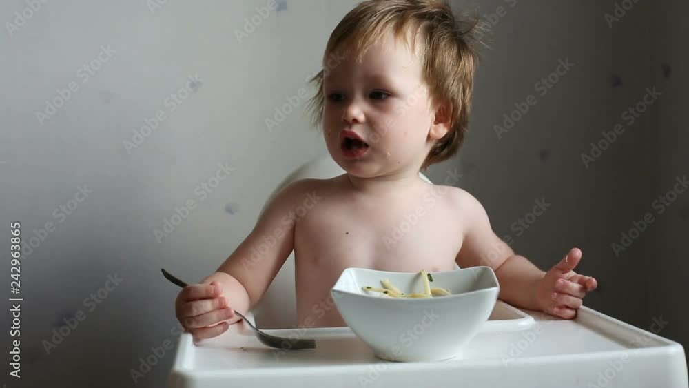 Toddler boy having pasta for lunch Toddler boy having pasta for lunch