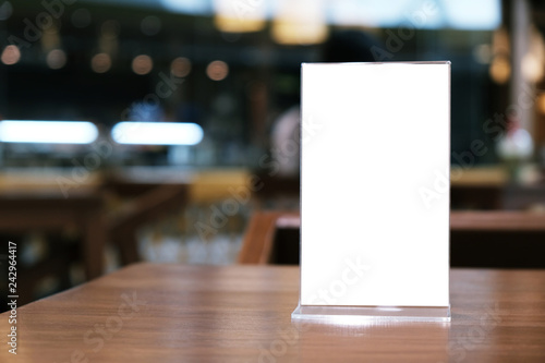 Wallpaper Mural Menu frame standing on wood table in Bar restaurant cafe. space for text marketing promotion. Torontodigital.ca