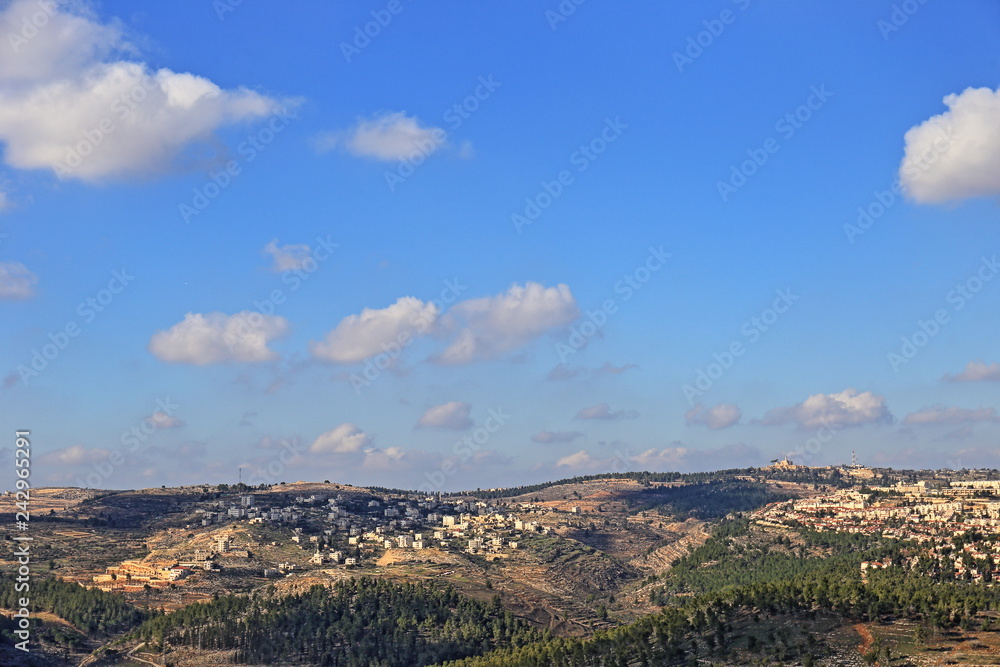 panoramic view of mountains and blue sky
