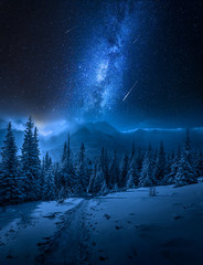 Tatras Mountains in winter at night and falling stars