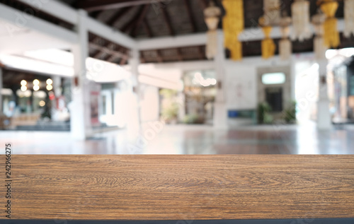 Wallpaper Mural Empty dark wooden table in front of abstract blurred bokeh background of restaurant . can be used for display or montage your products.Mock up for space. Torontodigital.ca