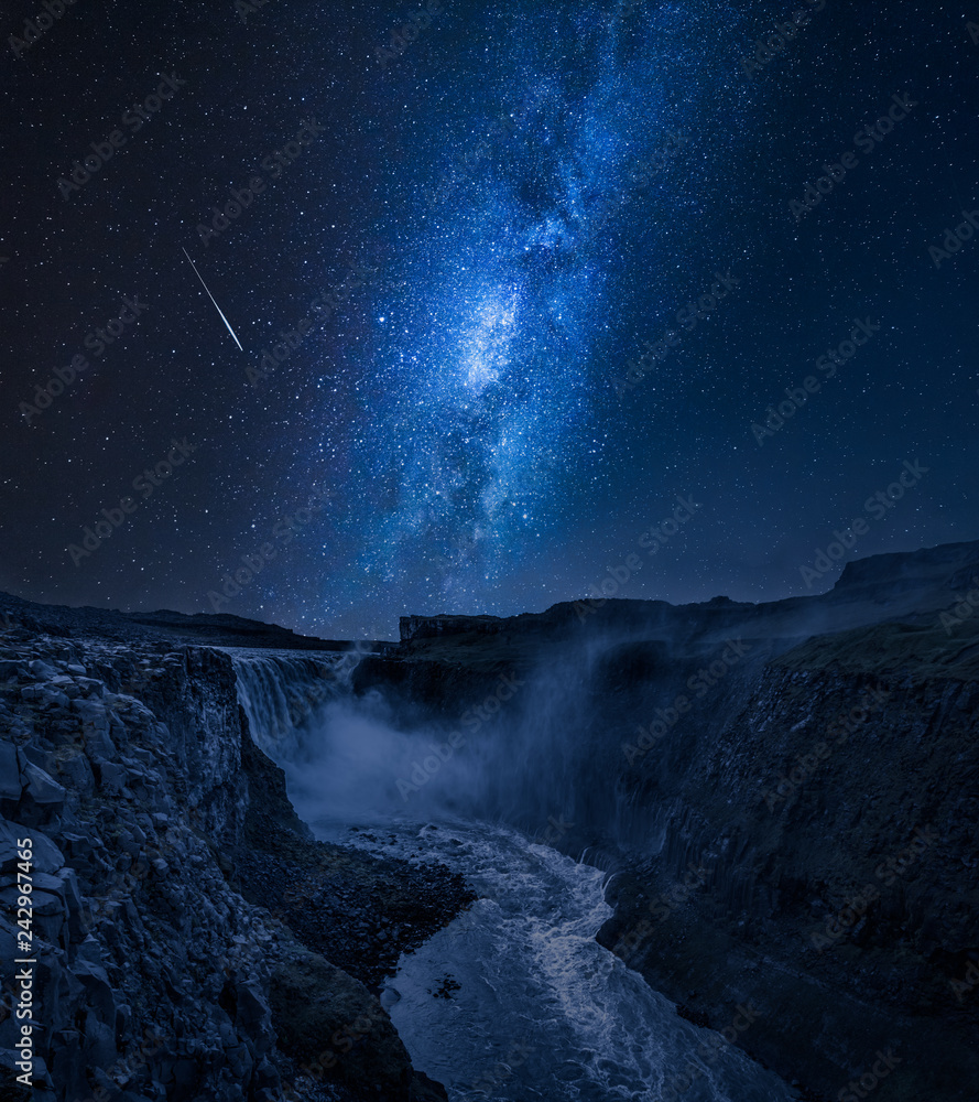 Fototapeta premium Stunning Dettifoss waterfall and milky way in Iceland at night