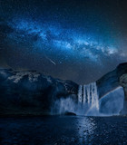 Stunning milky way and waterfall Skogafoss in Iceland at night