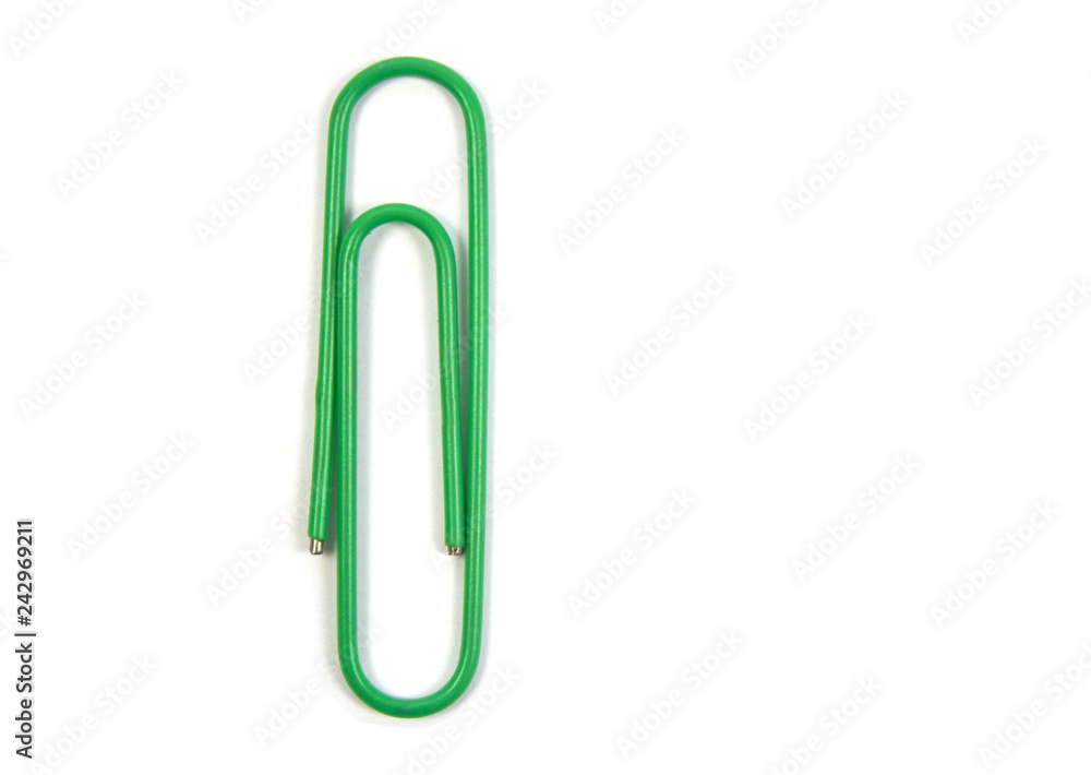 green paper clip isolated on white background green paper clip isolated on white background