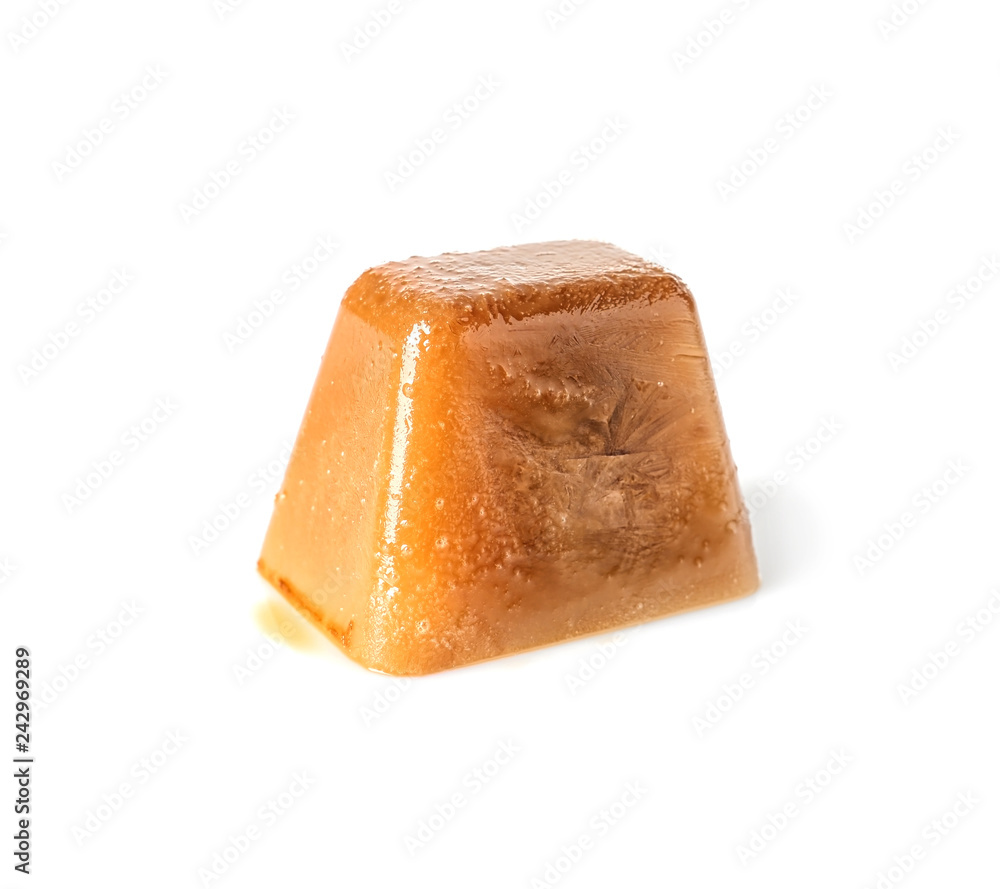 Ice cube made with coffee on white background Ice cube made with coffee on white background