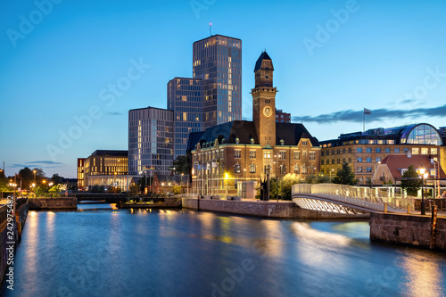 Malmo, Sweden. Beautiful cityscape with canal and skyline at dusk photo