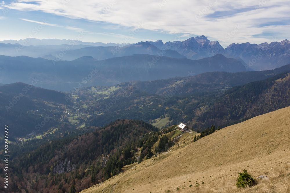 Panoramic view from mountain Golica in Karavanke with mountain hut in foreground, Slovenia