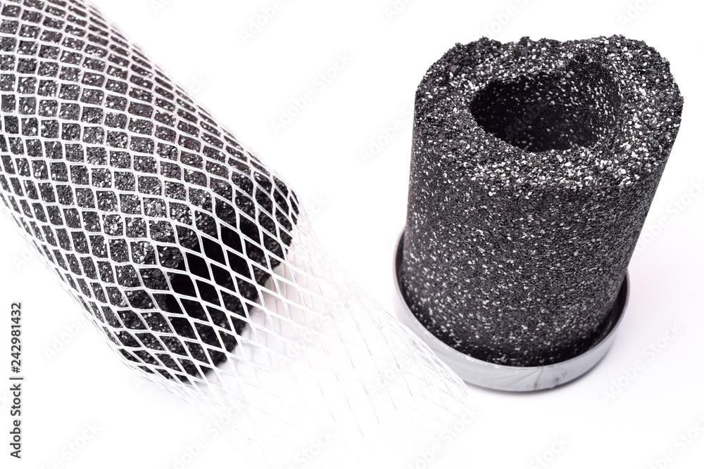 Carbon water filter cartridge isolated on white