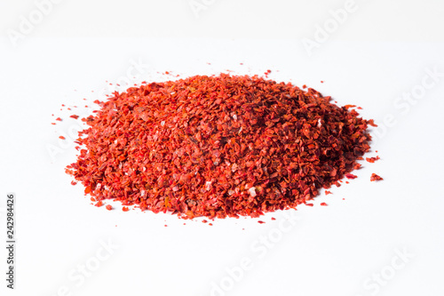 Фотография pile of gochugaru chili flakes