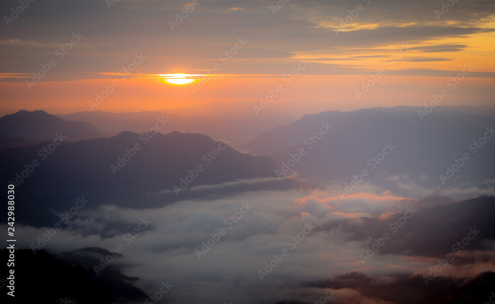 The picture of the sunset and the sun rising in the mist looks beautiful.