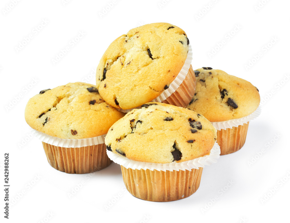 Delicious vanilla muffins with chocolate, isolated on white background. Muffins with paper, sweet food or unhealthy eating theme. Delicious vanilla muffins with chocolate, isolated on white background. Muffins with paper, sweet food or unhealthy eating theme.
