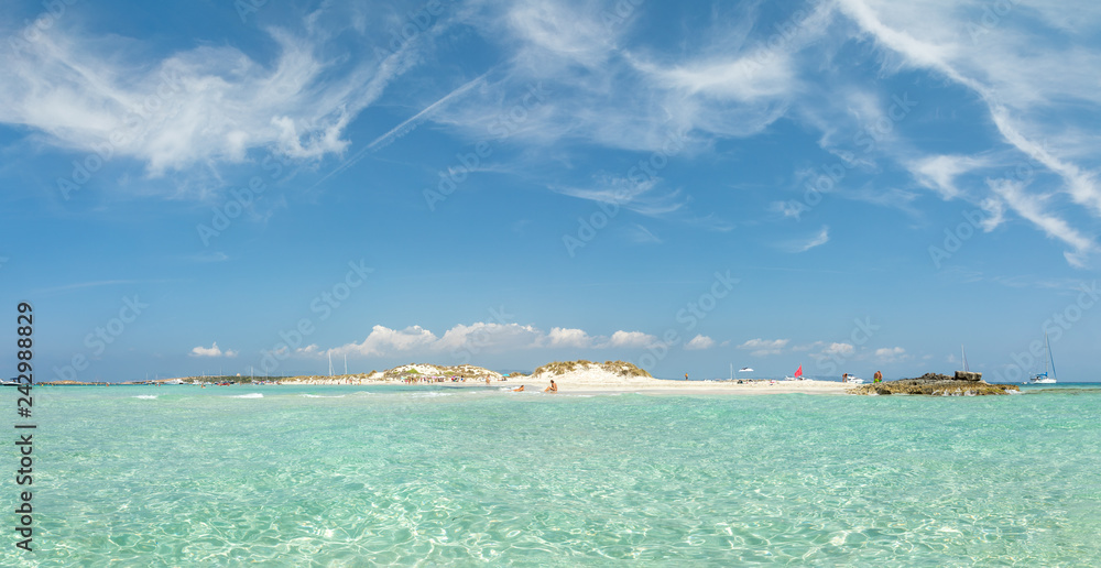Espalmador island. A tiny Balearic island that lies between Ibiza and Formentera with beautiful S'Alga beach. Spain.