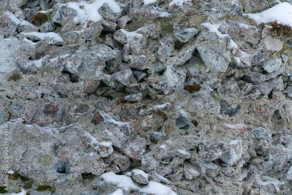 a wall of granite rocks as a background a wall of granite rocks as a background