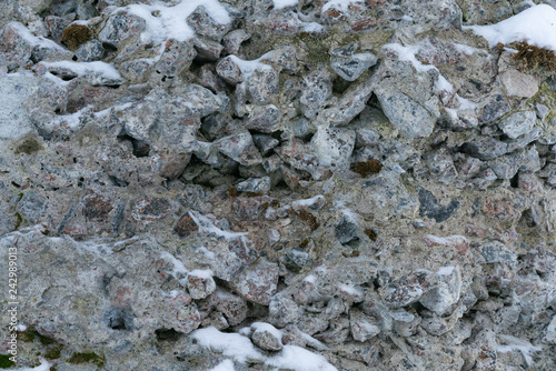 a wall of granite rocks as a background